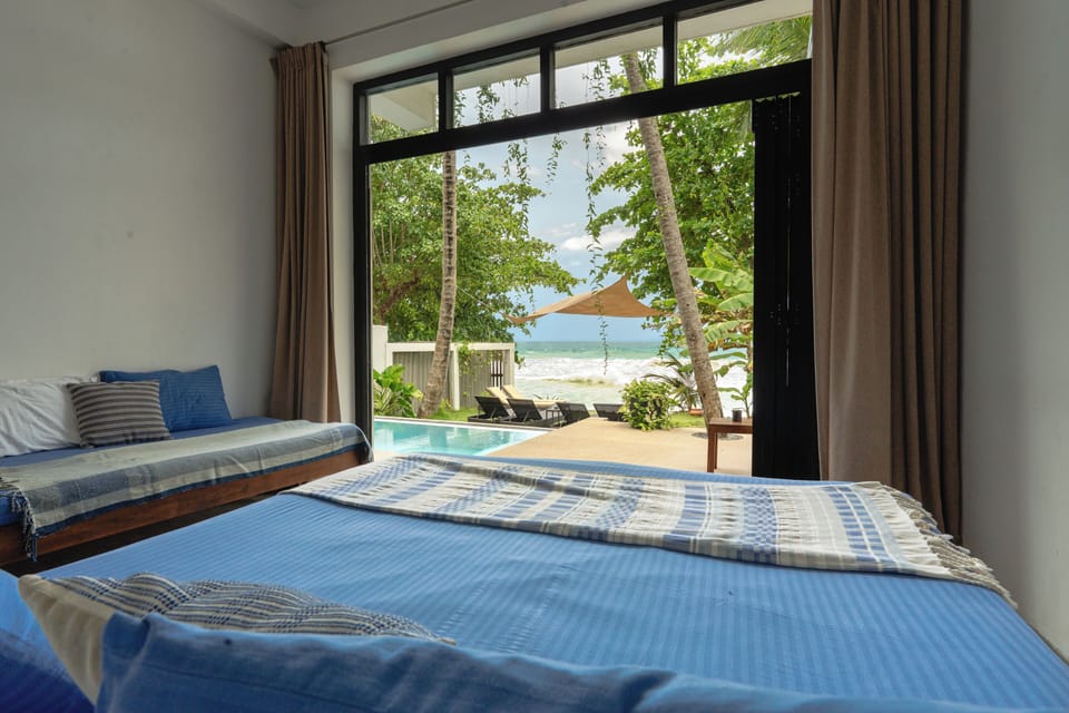 Triple Room, Ocean View | Select Comfort beds, minibar, desk, WiFi (free)