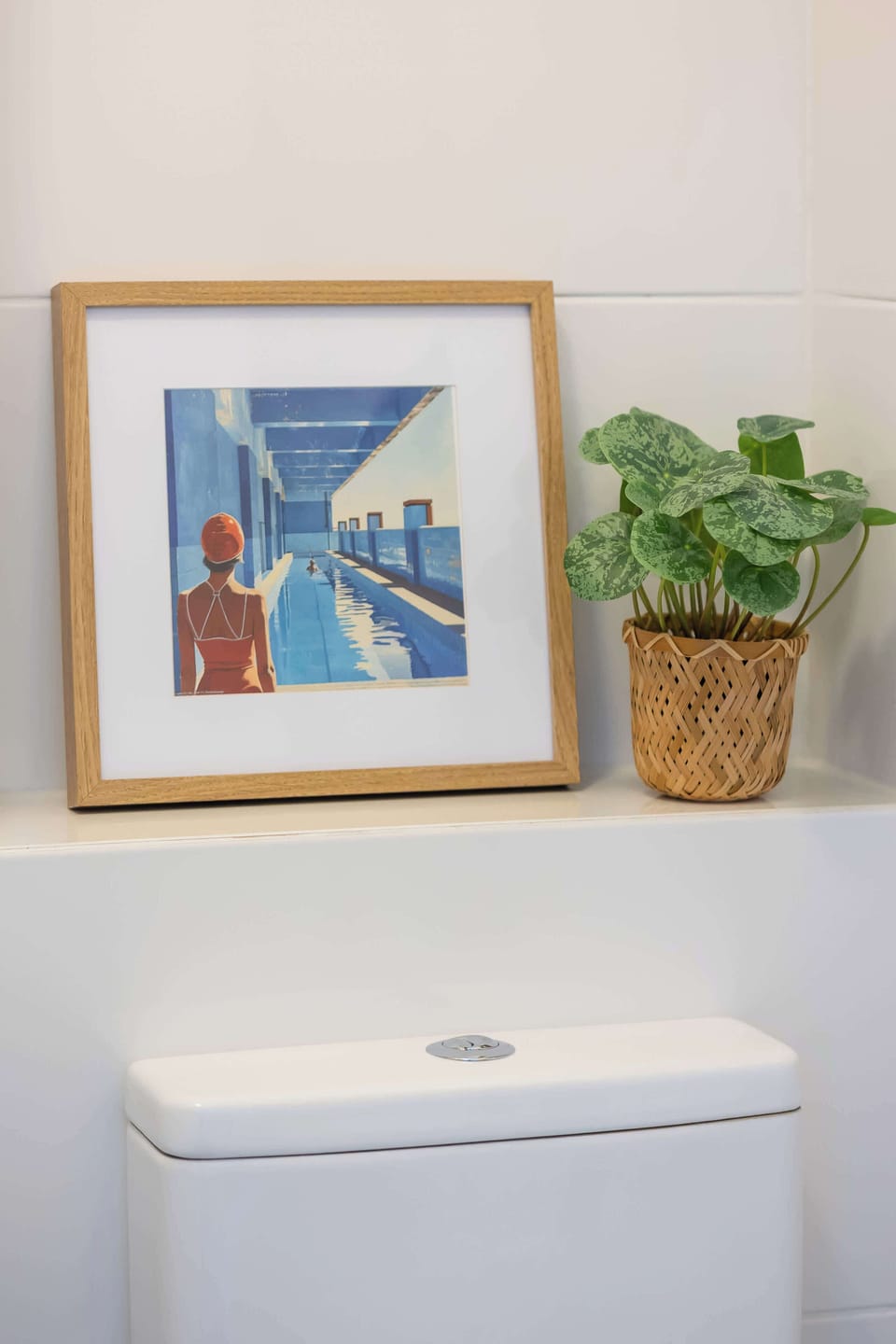 Comfortable bathroom with hairdryer.