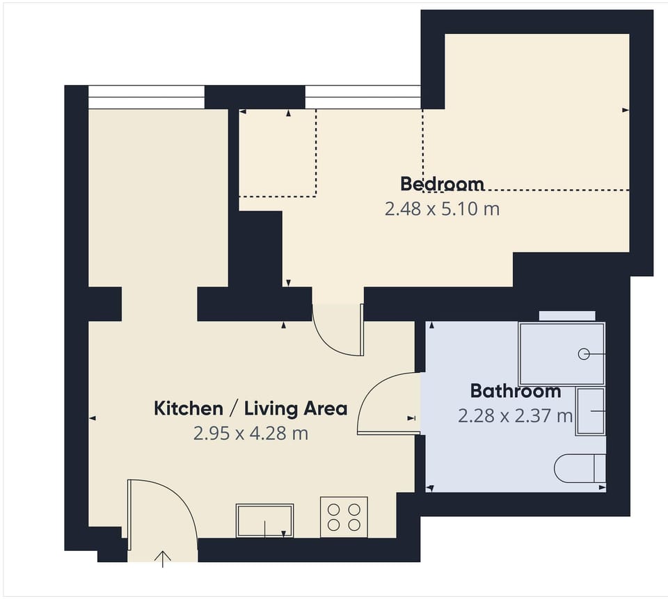 A detailed floor plan of the apartment showing layout and room divisions. It clearly labels the living room, bedroom, bathroom, and kitchen.


