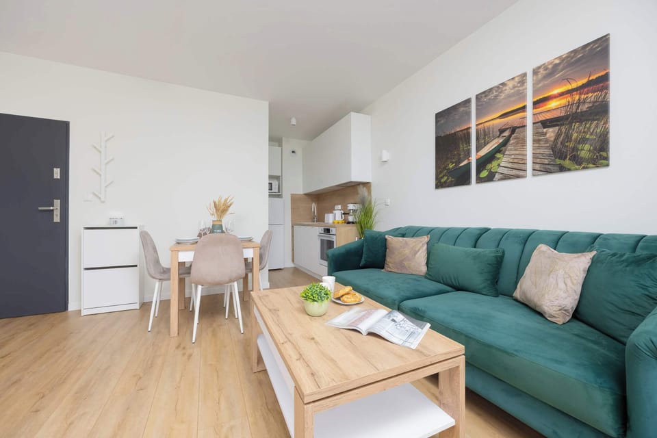 A modern living space perfect for relaxing or enjoying meals with loved ones.