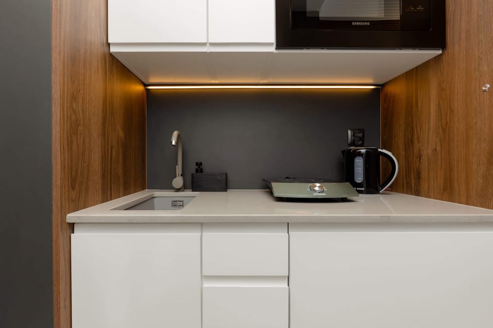 Kitchenette with microwave.