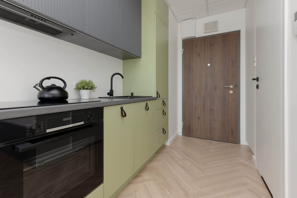 Studio with kitchen area.