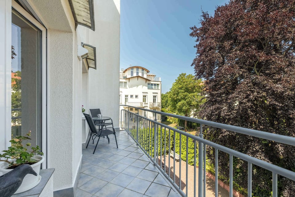 Private balcony with garden furniture.