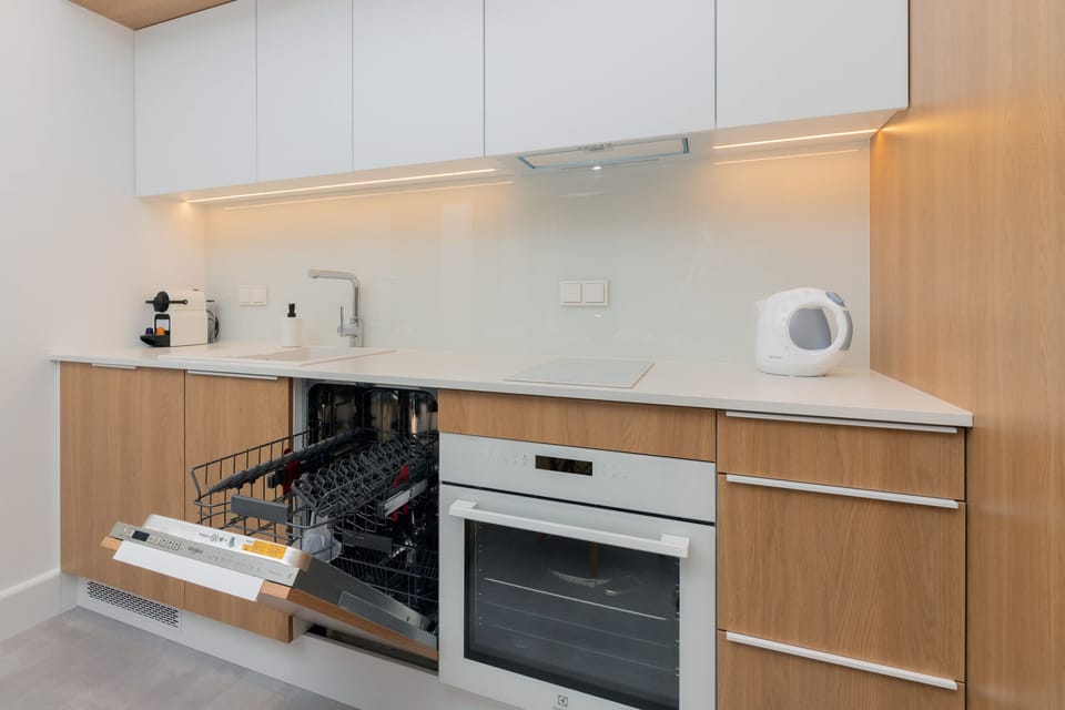 The kitchen area is perfect for cooking delicious meals.