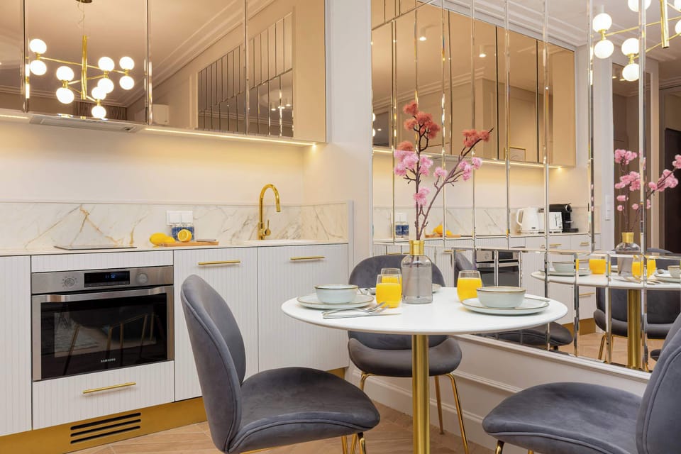 Modern, chic and fully equipped kitchenette with dining area.