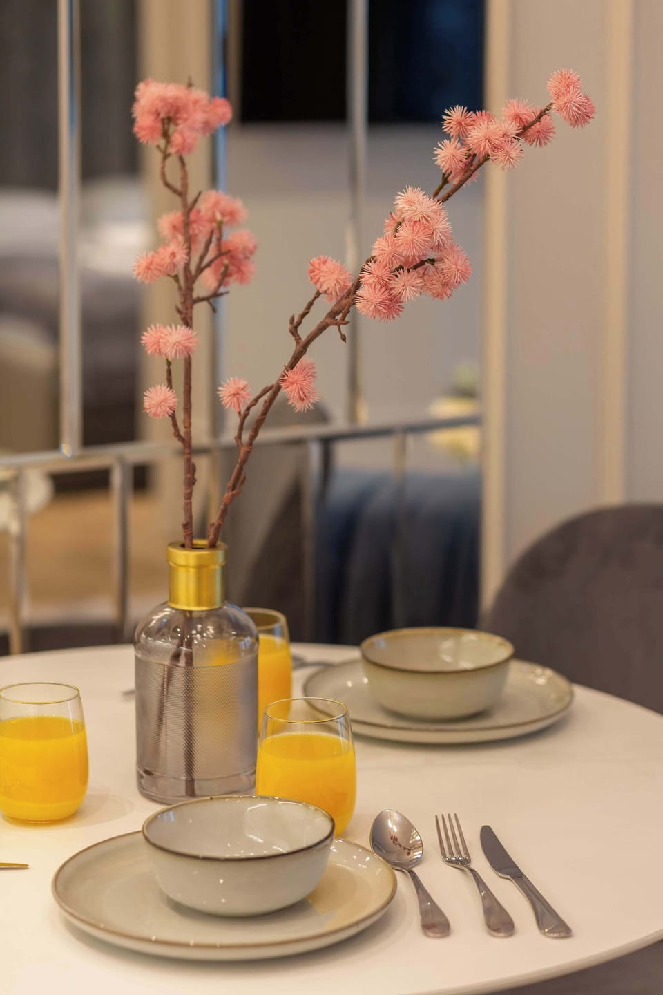 Dining table with tableware.