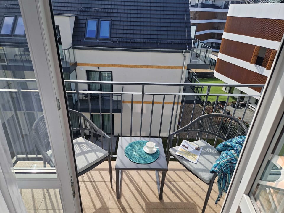 Photos of the furnished balcony.