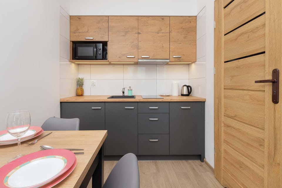 Fully equipped kitchenette and dining area.