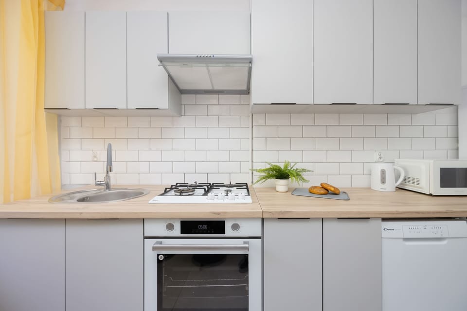 Fully equipped kitchen with appliances.