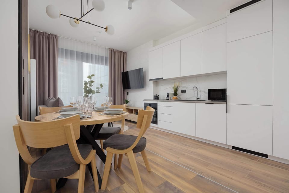 The open kitchen seamlessly connects with the living room for everyday convenience.