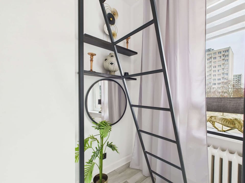 Mezzanine entrance, surrounded by stylish decorations and accessories.