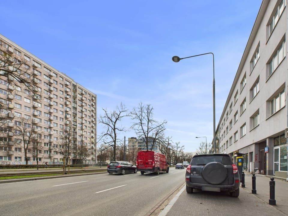 A neighborhood with wide sidewalks and urban infrastructure, offering convenience and easy access to key points of Warsaw.