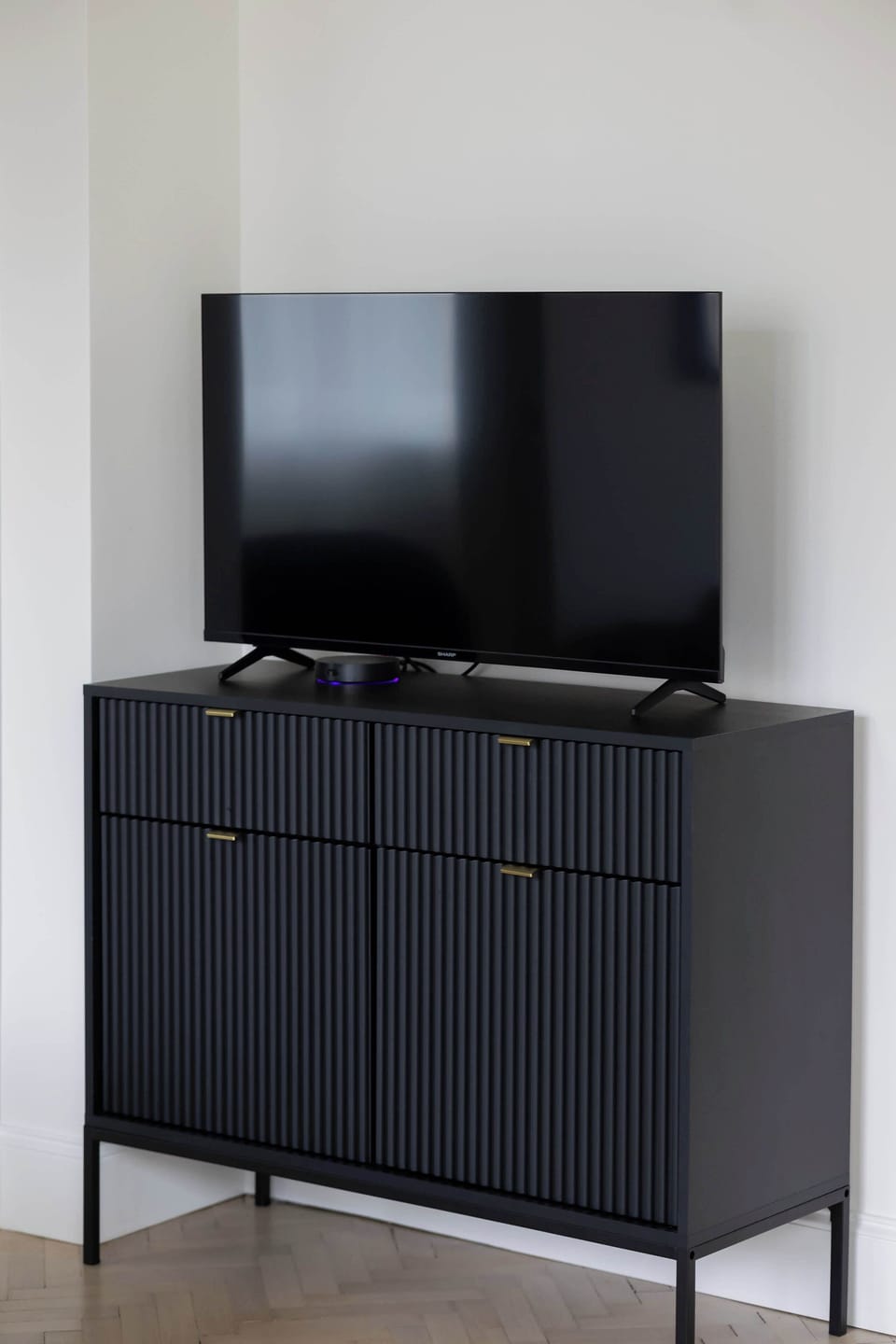 Enjoy your favorite shows on the flat-screen television in the elegant living area.