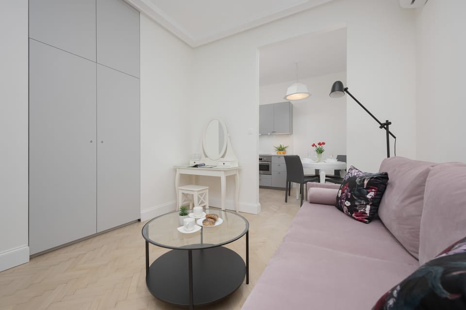 The living area's sleek design is both functional and aesthetically pleasing.
