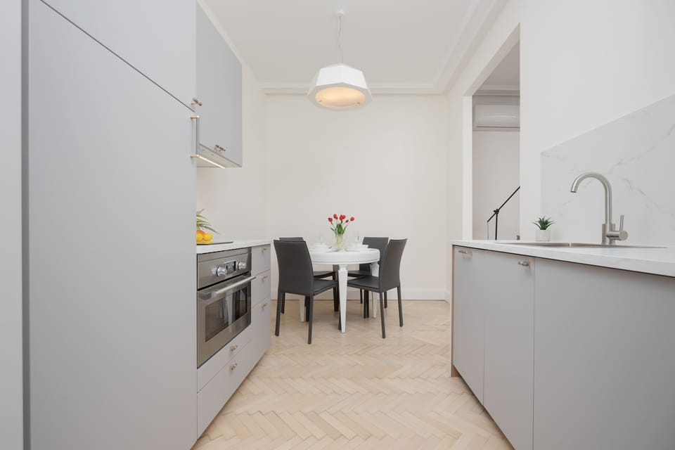 The fully equipped kitchenette includes everything you need for a home-cooked meal.