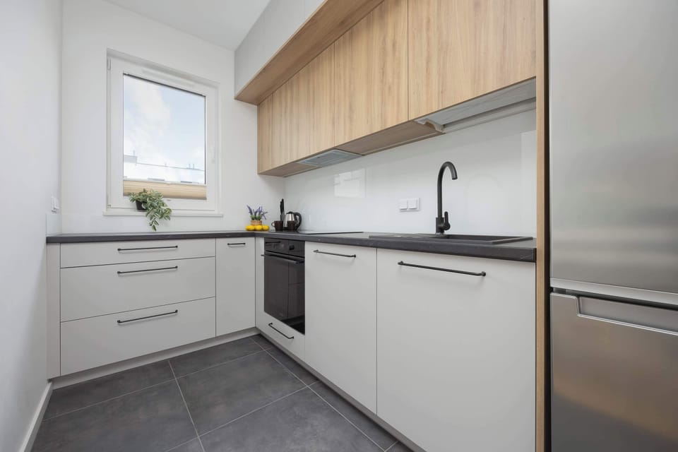 Cook and dine in style with the modern kitchenette and dining area.