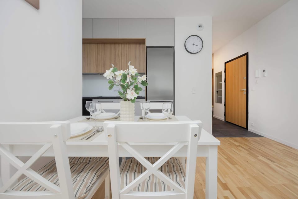 Enjoy your favorite shows on the flat-screen television in the elegant living area.