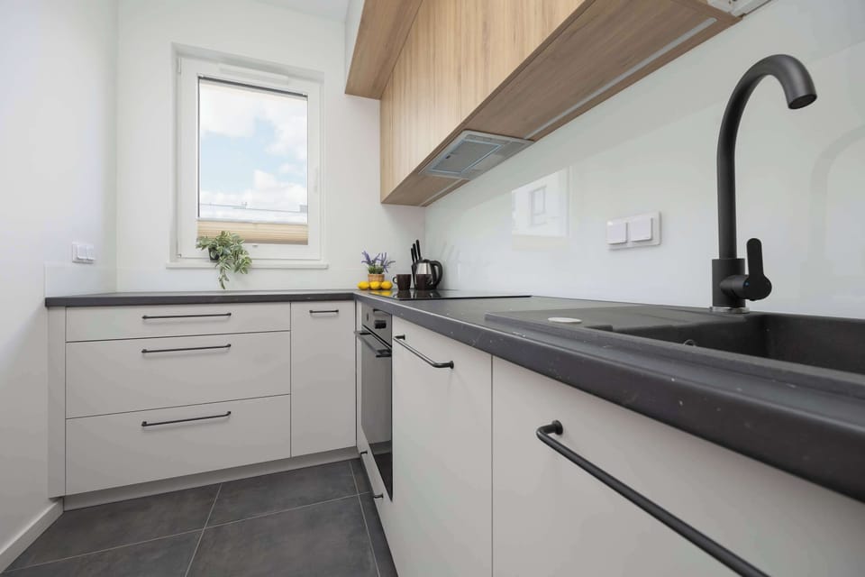 The kitchenette's practical layout maximizes space and functionality.