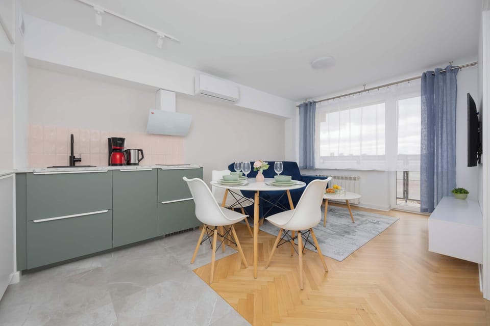 The view from the kitchen to the living room reveals a smart layout designed for everyday comfort.