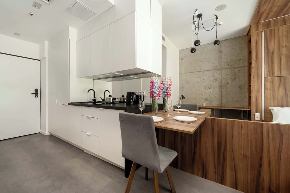 Studio space with kitchenette and dining area.