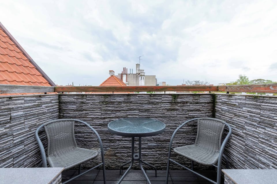The balcony located on the 3rd floor with balcony furniture will be a great place to drink your morning coffee.