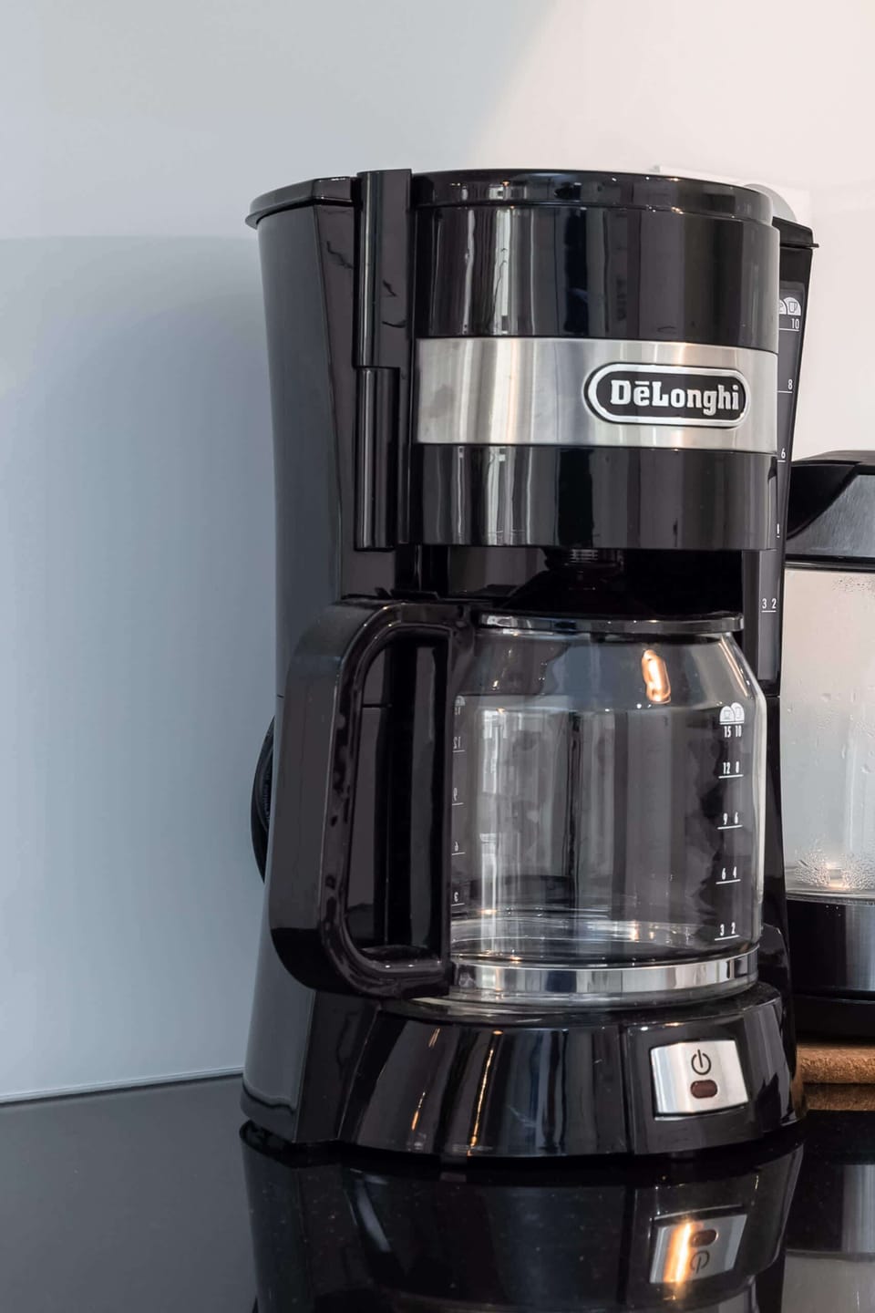Kitchenette with coffee machine.