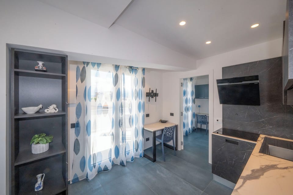 Luxury Loft, Sea View | Private kitchen | Electric kettle, cleaning supplies