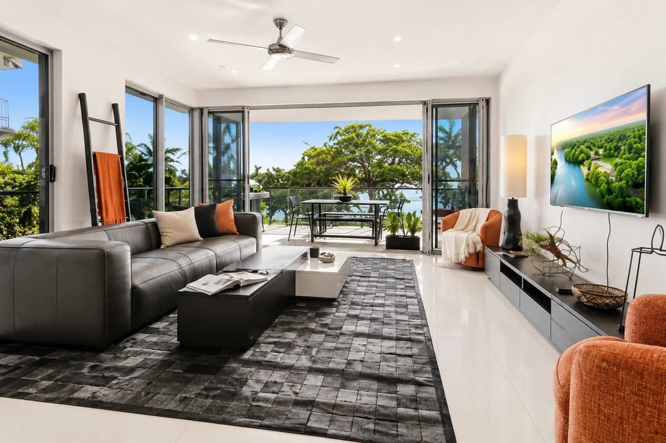 Modern Open-Plan Living Flowing to Scenic Outdoor Balcony