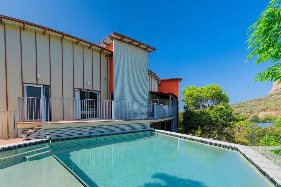Private swimming pool with tropical surrounds