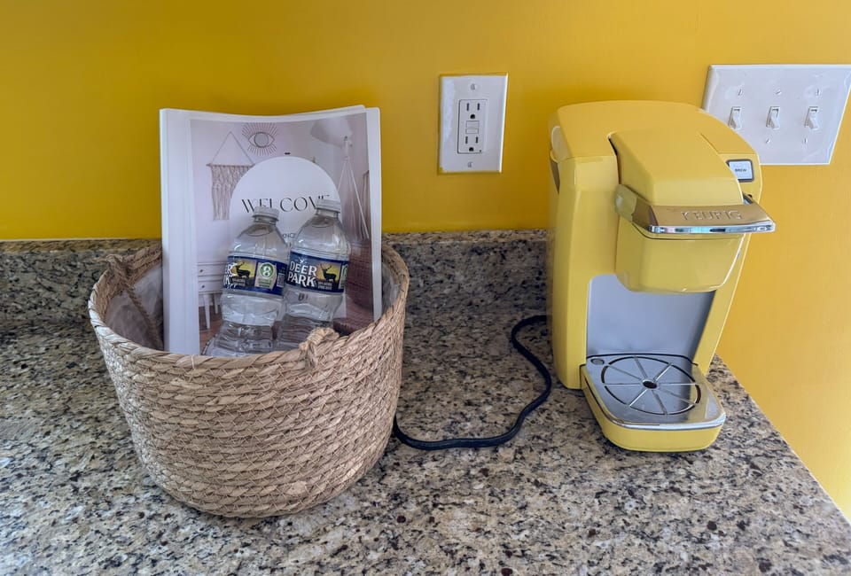 Keurig coffee pot, single use coffee pods provided.
