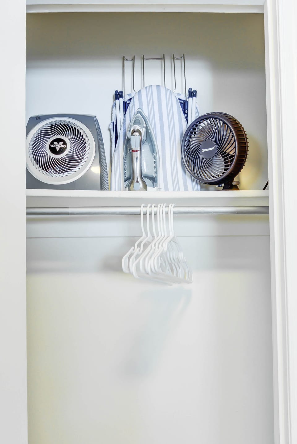 Make yourself at home! The iron, ironing board, and fan in the closet are ready to keep you looking sharp and feeling cool.
