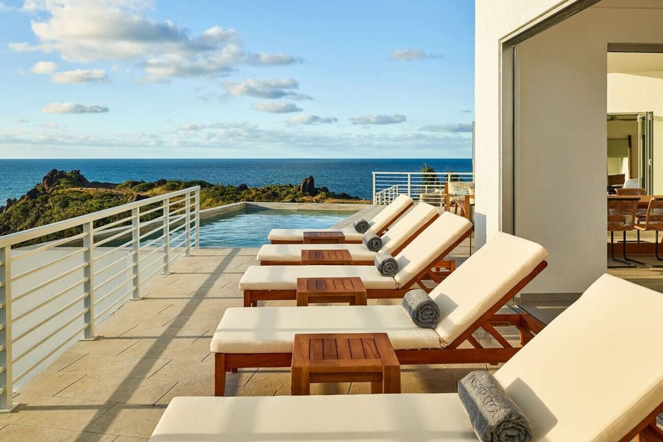 Lounge in rhythm with the sea—where sunlight and surf create a restful harmony.