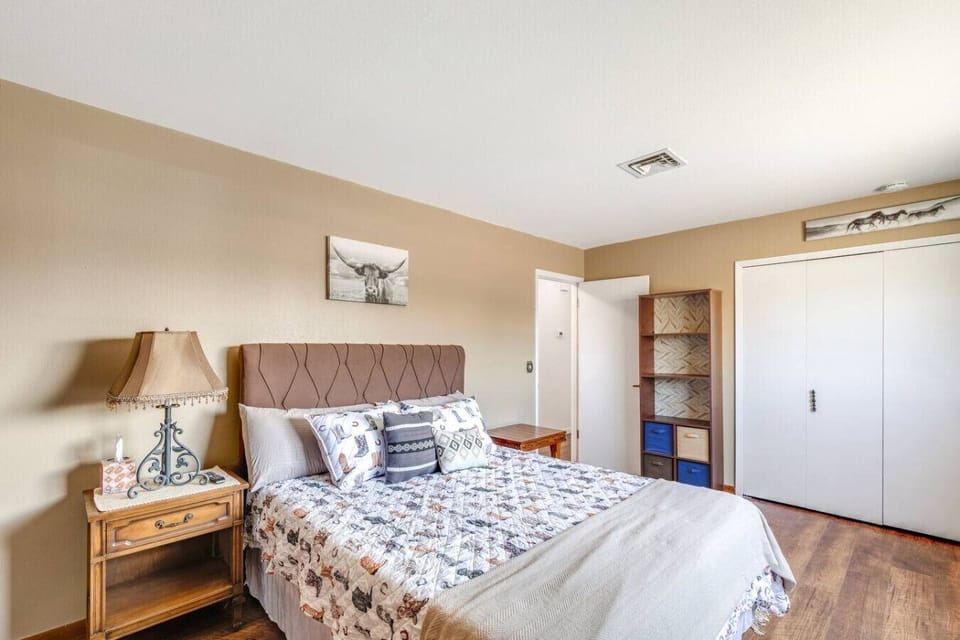 Relax and recharge in this cozy queen bedroom, perfect for a peaceful night’s sleep