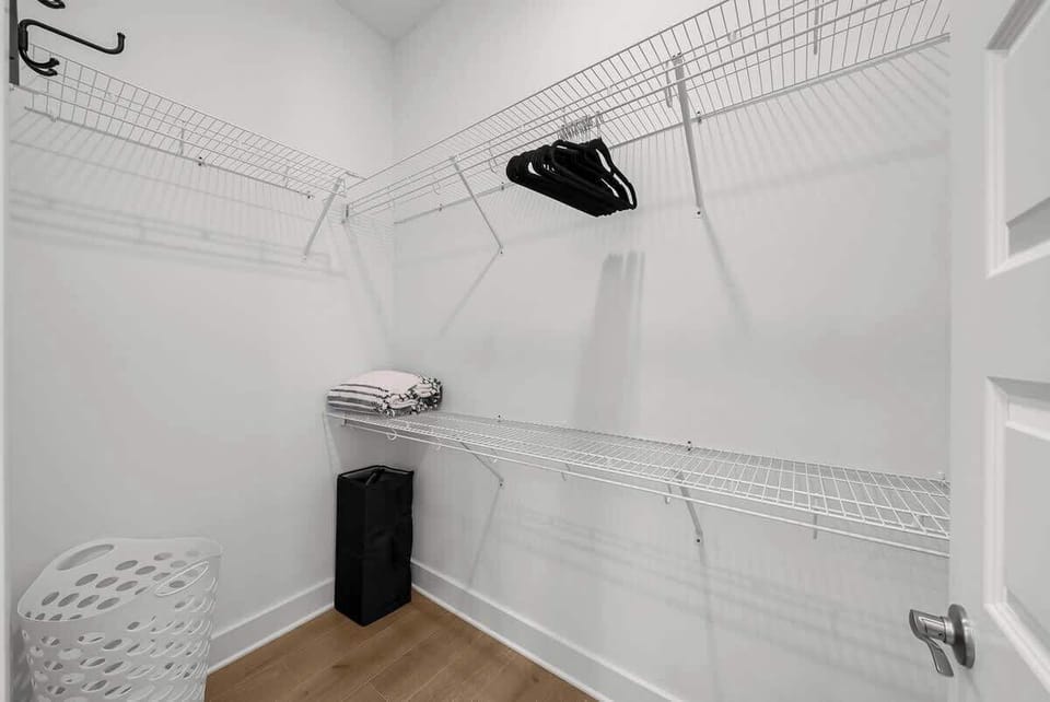 Bedroom features a large walk-in closet.
