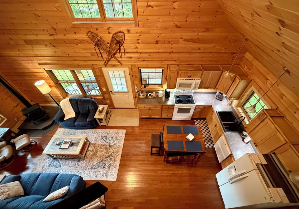 View of open first floor plan from loft landing.