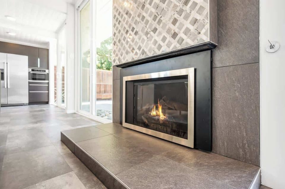 The gas fireplace heater in the living room to stay cozy in the evenings.