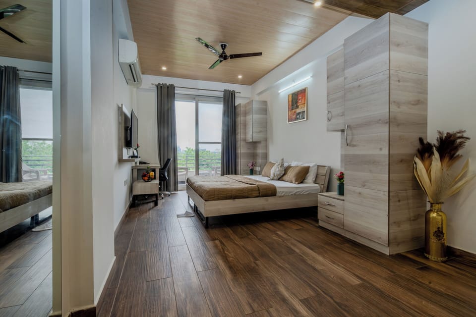 Family Room, Balcony, City View | Iron/ironing board, free WiFi, wheelchair access