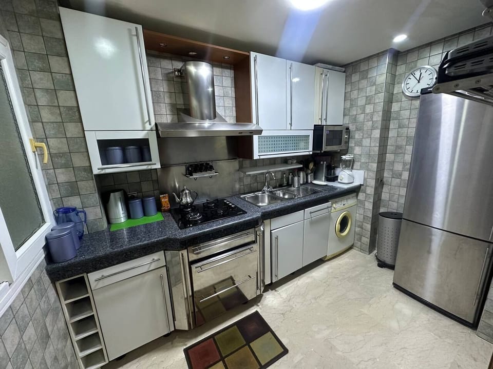 Apartment | Private kitchen | Full-size fridge, microwave, oven, stovetop