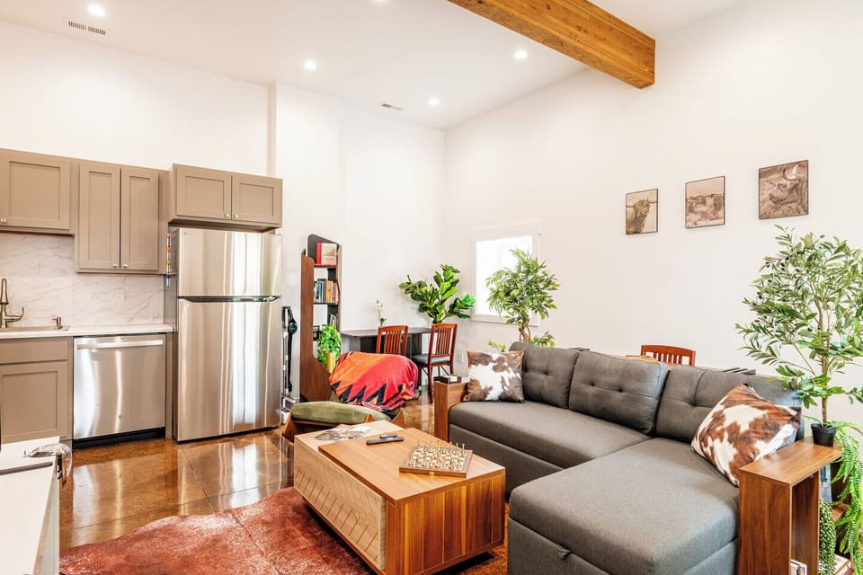 An open layout keeps everyone connected, whether relaxing or cooking nearby.