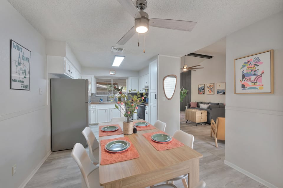 Open-concept kitchen & dining area—perfect for shared meals, laughter & easy vacation living.