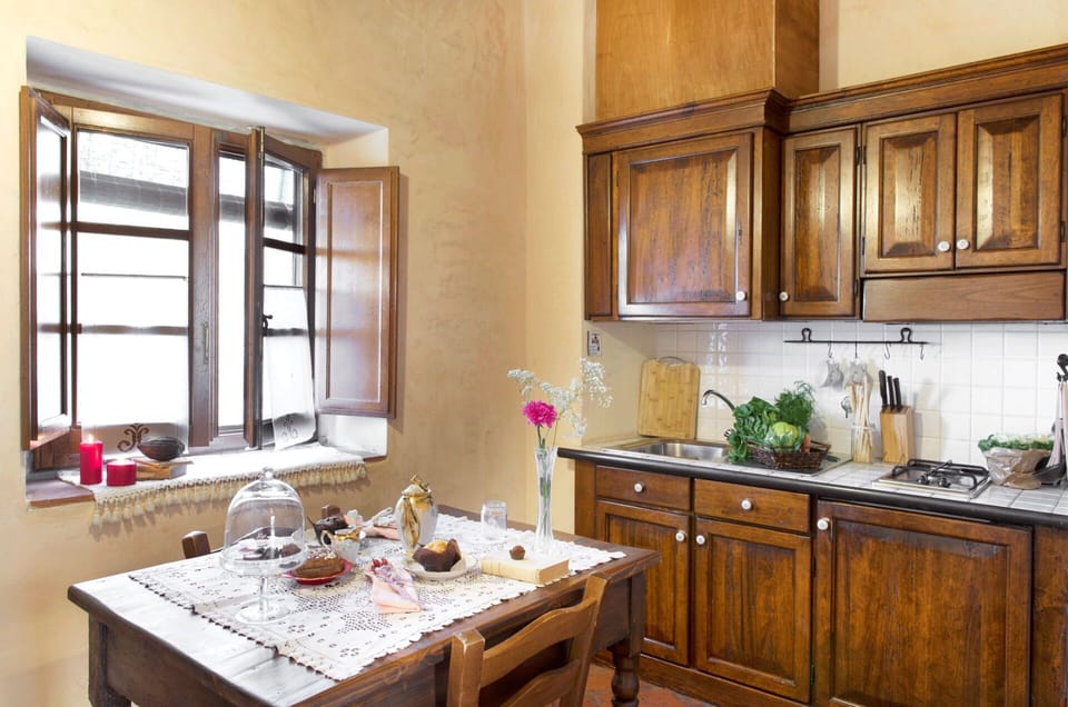Furniture, Interior Design, Kitchen, Cabinetry, Countertop, Wood, Flooring, Kitchen Appliance, Cupboard, Room