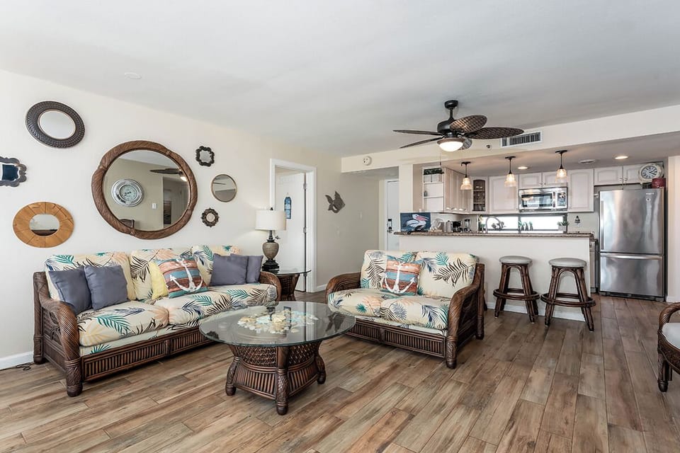 Open-concept and ocean-inspired, from kitchen to couch.