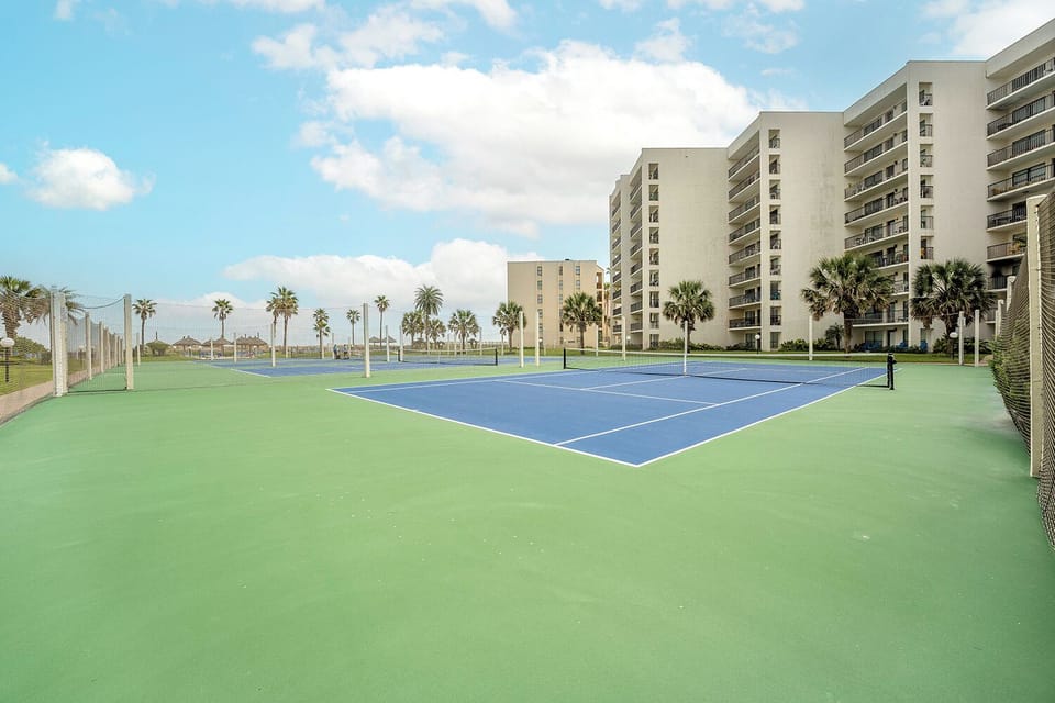 Who needs Wimbledon when you've got sand between your toes and a Saida Towers tennis court with a South Padre Island view? Game, set, piÃ±a colada!