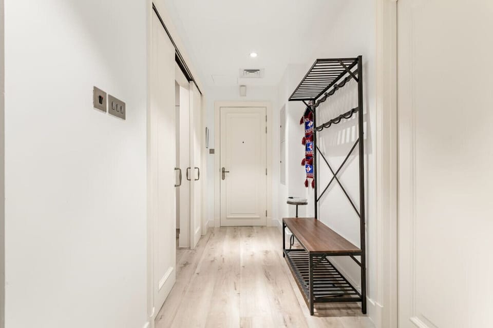 Entryway: Stylish hall with sleek design, perfect for welcoming your Dubai adventure!