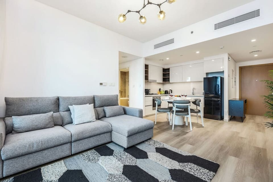 Living Room: Bright and airy, enjoy lively gatherings in this chic space with modern touches!