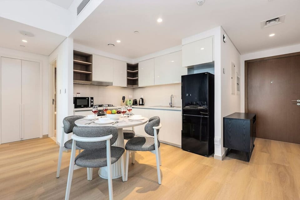 Dining Area: Enjoy meals with style in this bright space featuring sleek furniture and modern decor!