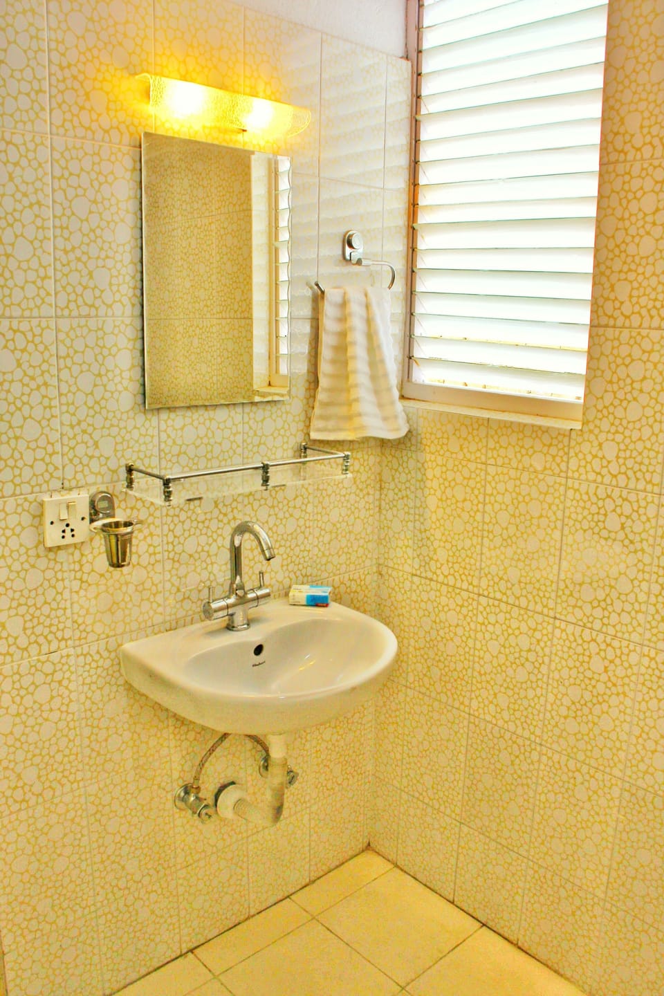 Shower, free toiletries, slippers, towels