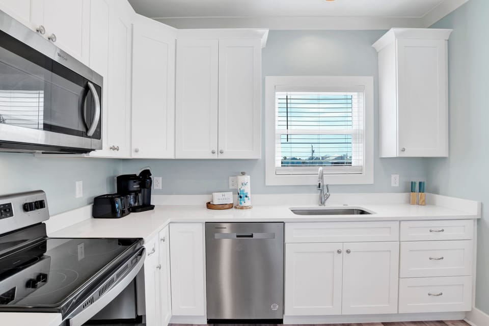 Newer constructed home with stainless appliances and stone counters