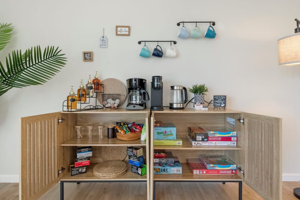 Charming coffee bar w/ Keurig, drip maker & games.