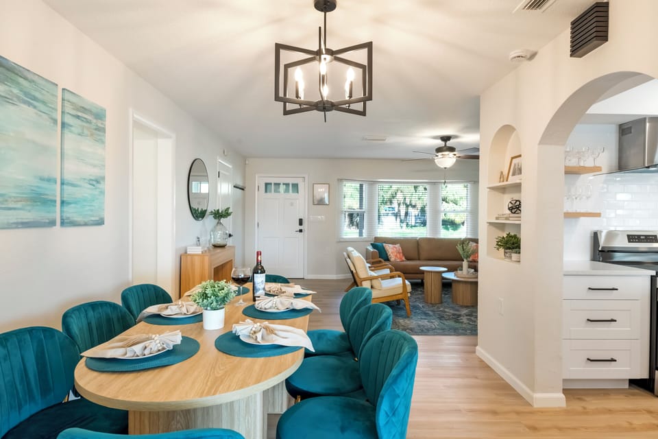 Elegant dining room with table for 8—perfect for meals, gatherings & memories.